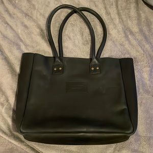 Parker Clay black carryall used less than 10 times